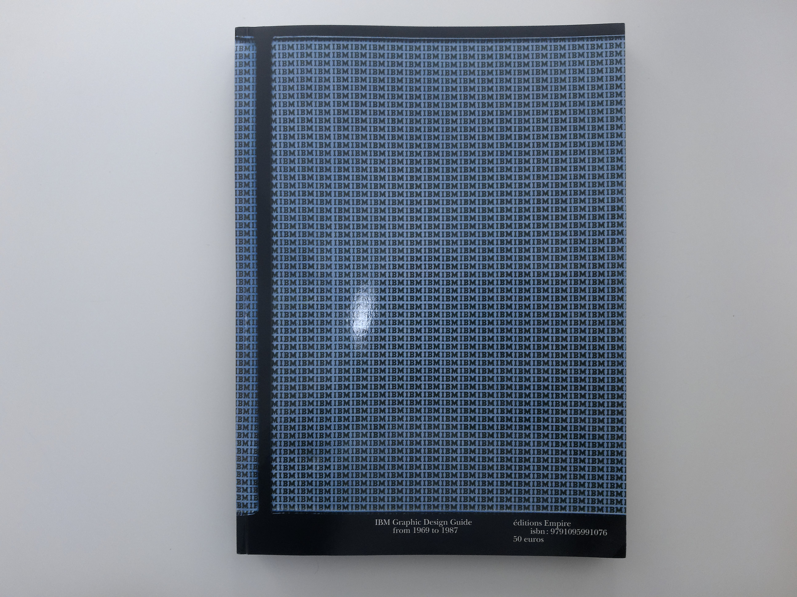 A photographed book cover for an IBM graphic standards manual.